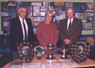 Geoffrey Williams, June
Williams and Society president John Reid display
trophy's won at the East Midland and East
Anglian Philatelic Convention, 2000